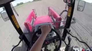 Massey Ferguson 5460 with a 30 foot Brillion cultipacker