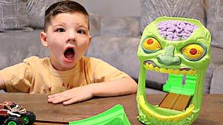 ZOMBIES in MY HOUSE! Caleb & Mommy Play with MONSTER JAM ZOMBIE RACE TRACK!