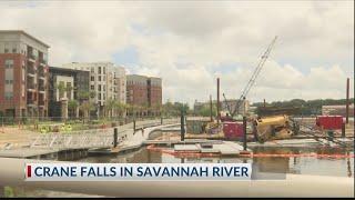 Crane tips over into Savannah River