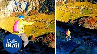 Harry Potter base jumpers leap from cliff with broomsticks