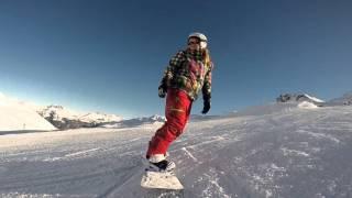 GIRL SNOWBOARDING AT