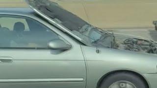 Woman drives for miles on I-43 NB with hood up | FOX6 News Milwaukee