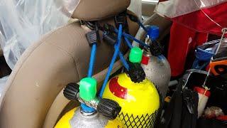 How to strap safely up to 3 scuba/dive tanks in the vertical position to the car seat