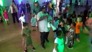 Big Mucci teaches the BCA Shuffle Line Dance to Kindergartners