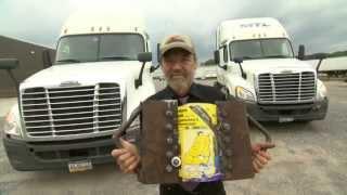 Tearing two interlaced phone books apart using two 18 wheeler trucks