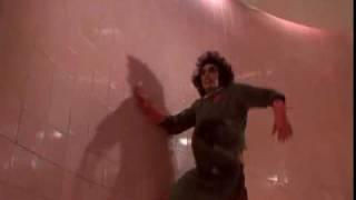 Dr. Frank-N-Furter chasing Rocky