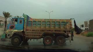 Exploring Karachi (Pakistan) in rain - suburbs to the center