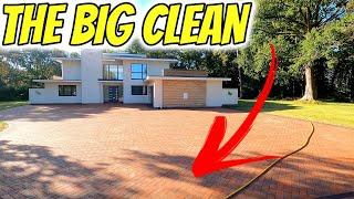 Pressure washing a large clay block paved driveway