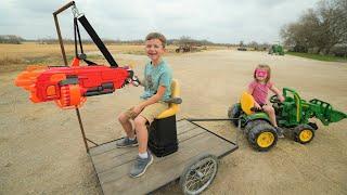 Using nerf gun tractor to stop a bad guy | Tractors for kids