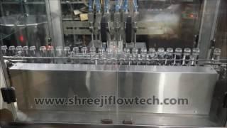 6 HEAD GEAR PUMP or FLOW METER BASED IN LINE LINEAR FILLING MACHINE - Shreeji Flowtech Systems