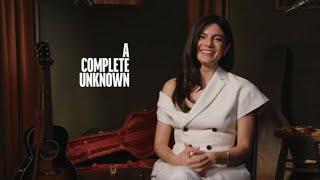 Monica Barbaro Talks A Complete Unknown Set Secrets & Filming With Timothée Chalamet & Elle Fanning