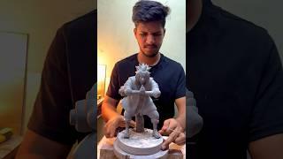 Removing support from anime character. #murtiartist #anime #sculpture #clayart