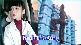 Winter freight journey. Beautiful female driver Xiang