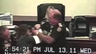 Woman sparks courtroom brawl