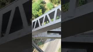 Bridge view By train window #nature #bridge #view #pool #train #youtube #subscribe