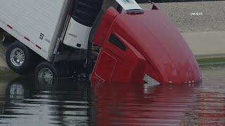 Semi-Truck Crashes Into Canal in Lebec