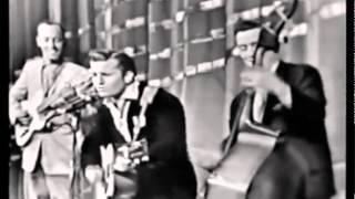 Johnny Burnette Trio-Train Kept A Rollin'