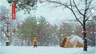 On a snowy winter, it's warm inside the tent 