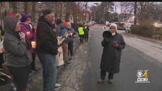 Residents at "SoMa At The T" apartment complex in Mattapan hold rally over rising rent