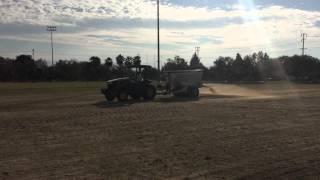 Soil decompaction , Top Dressing and Overseeding on Soccer Fields