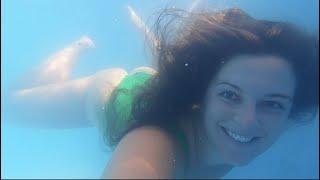 Swimming Alone Underwater in Florida Resort Pool