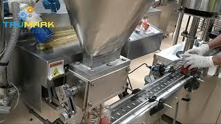 AUTOMATIC JAM FILLING AND LUG CAPPING MACHINE