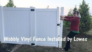 Wobbly Lowes Vinyl Fence