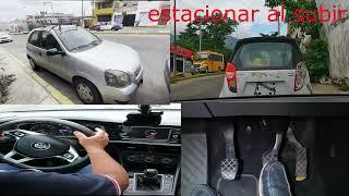 como estacionar carro entre dos autos de subida y bajada