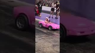 Little girl drifting with a to car 