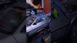 Delorean with Doc, Marty and Biff NECA figures.