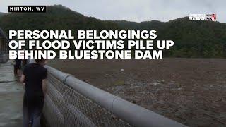 Trees, debris, personal belongings pile up at Bluestone Dam as hurricane floodwaters move through WV