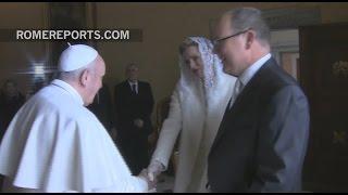 Albert and Charlene of Monaco give the Pope fruit and cheese during Vatican visit