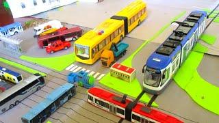 Siku 1683 Roll-off tipper with crane / Majorette Lion's City bus/ Articulated Trolleybus / Siku Tram