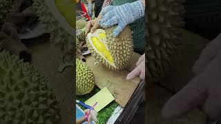 Trying Musang King durian fruit for the first time