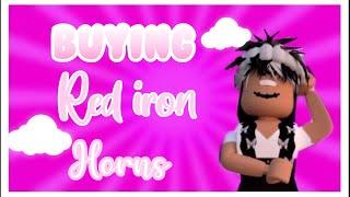 Buying red iron horns on Roblox!!