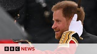 Prince Harry arrives at King Charles's Coronation in Westminster Abbey - BBC News