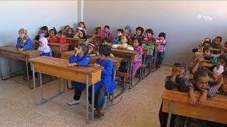 Syrian kids back to school in Idlib province with memories tainted by violence