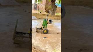 John Deere 5050d with powerful engine in mud