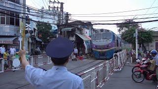 Train SE8 Saigon - Hanoi passing in Ho Chi Minh City (2015)