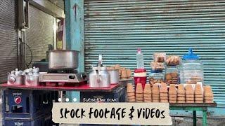 Enjoying Chai at a Traditional Tea Stall in Banaras | Stock Footage & Videos