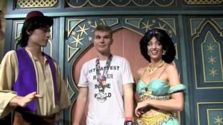 Aladdin and Jasmine meet Tommy after his race at Mickey's Very Merry Christmas Party