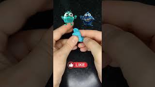 Oddly Teal Creature vs. Cute Dark Blue Monster Cupcake Showdown