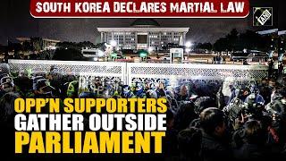 Martial Law in South Korea: Opposition supporters gather outside parliament, chant slogans