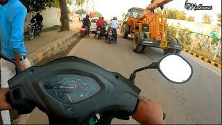 Scooty driving in Traffic road.Please Subscribe & Support us