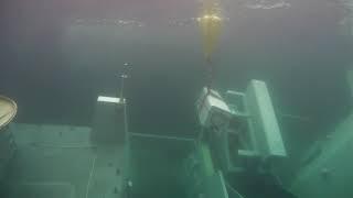 Removal of Naval Strike Missile (NSM) launch canisters from the wreck of the frigate Helge Ingstad