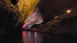 Viewing the Stalagmites by Boat in the Yellow Dragon Cave