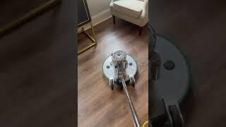 Clean and buff luxury vinyl plank floors with a large machine