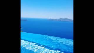 Infinity pool amazing view in Santorini Greece