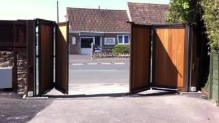 Automated, Wooden Infill, Bi folding Gates - The Electric Gate Company