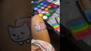 Here is a painting of the classic Nyan Cat! Poptart kitty! What next?? #facepaint #facepainting